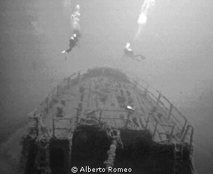 Divers on the stern  exploring the wreck of " Capua".
In... by Alberto Romeo 